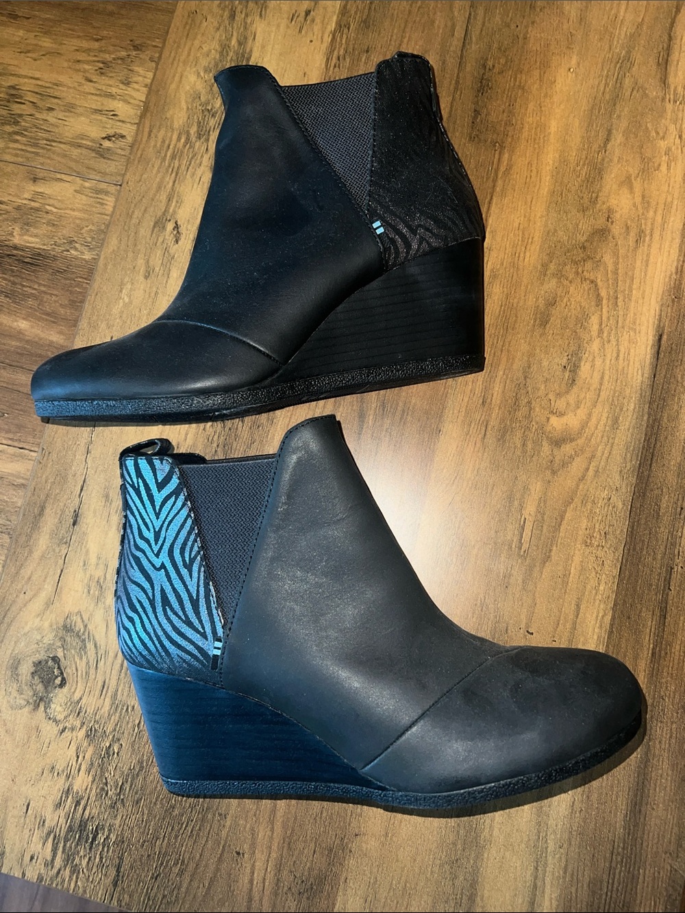 Brand new, Toms Women’s Black Wedge Ankle Boots with Blue Zebra Accent